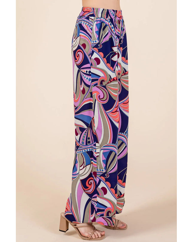 Colorful patterned pants on a beige background