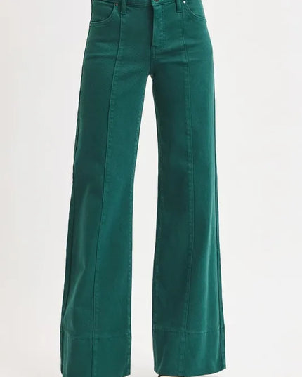 Emerald flared jeans on a white background
