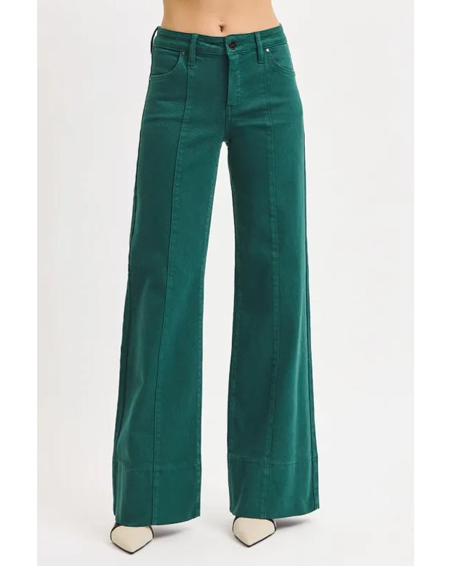 Emerald flared jeans on a white background