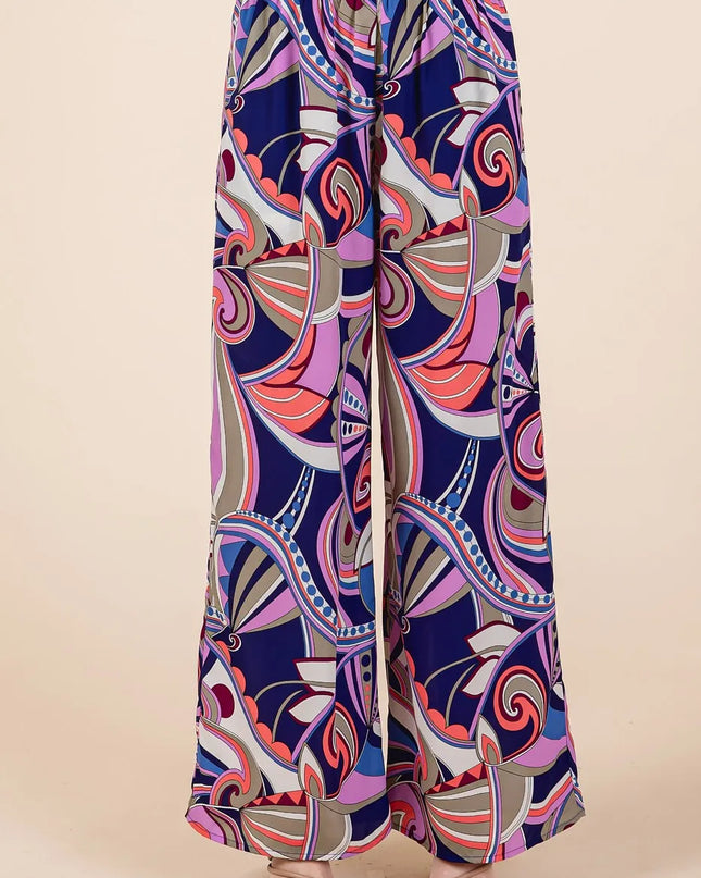 Colorful patterned pants on a beige background