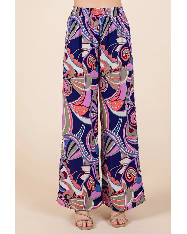 Colorful patterned pants on a beige background