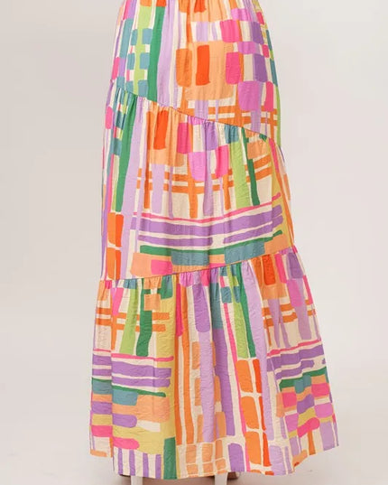 Colorful geometric patterned skirt on a white background