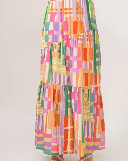 Multicolored geometric patterned skirt on a white background