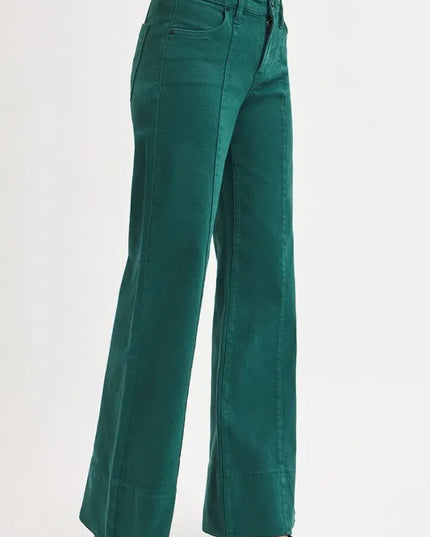Emerald flared jeans on a white background