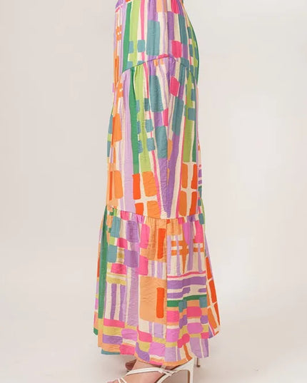 Multicolored geometric patterned skirt on a white background